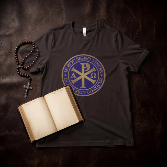 Dark t-shirt with a gold and blue circular emblem featuring the Chi Rho symbol and text.