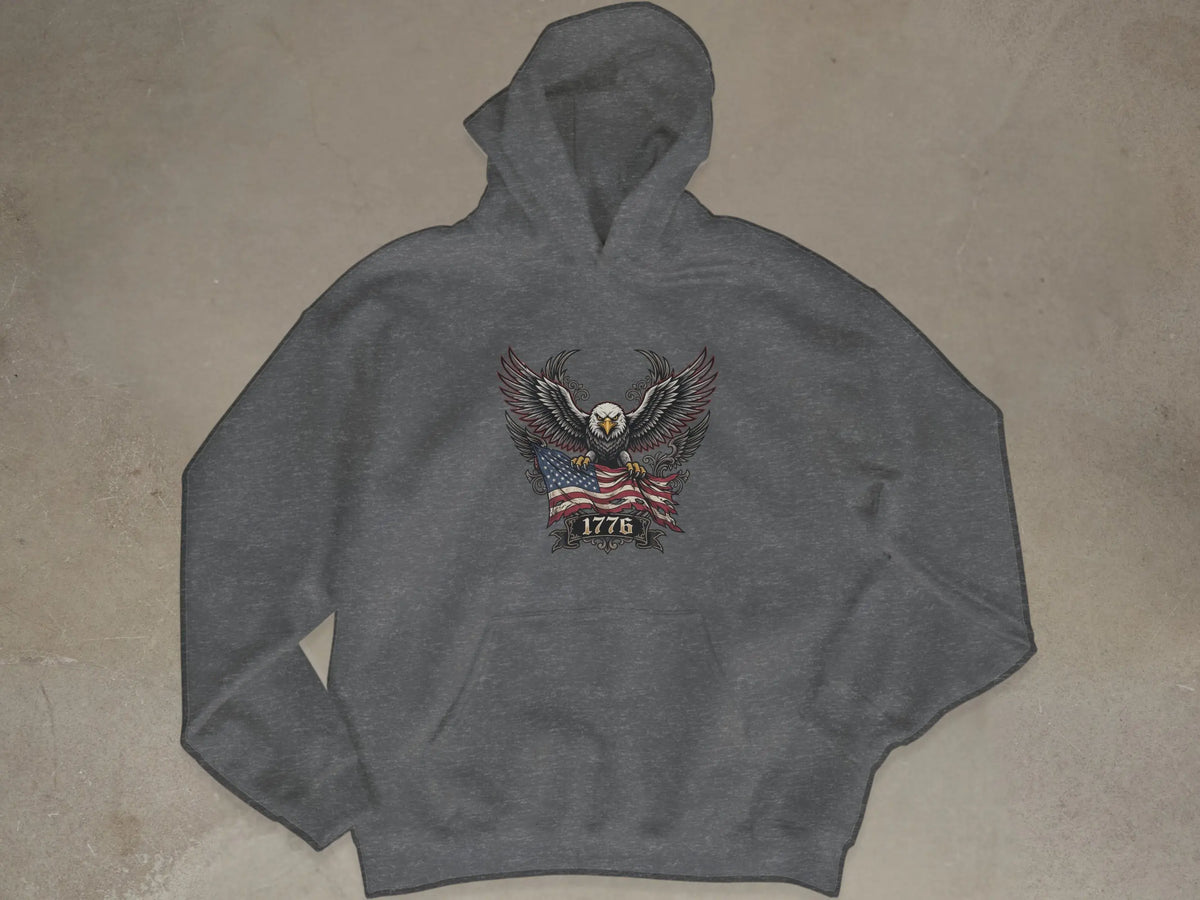 Grey hoodie with eagle, American flag, and "1776" graphic.