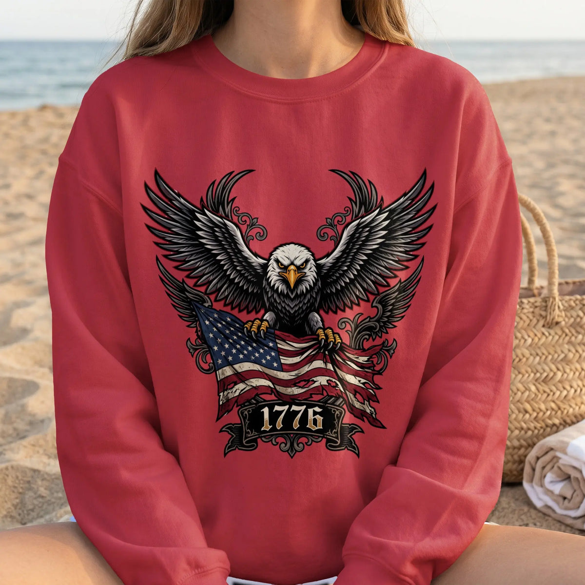Red sweatshirt with eagle, American flag, and "1776" graphic.