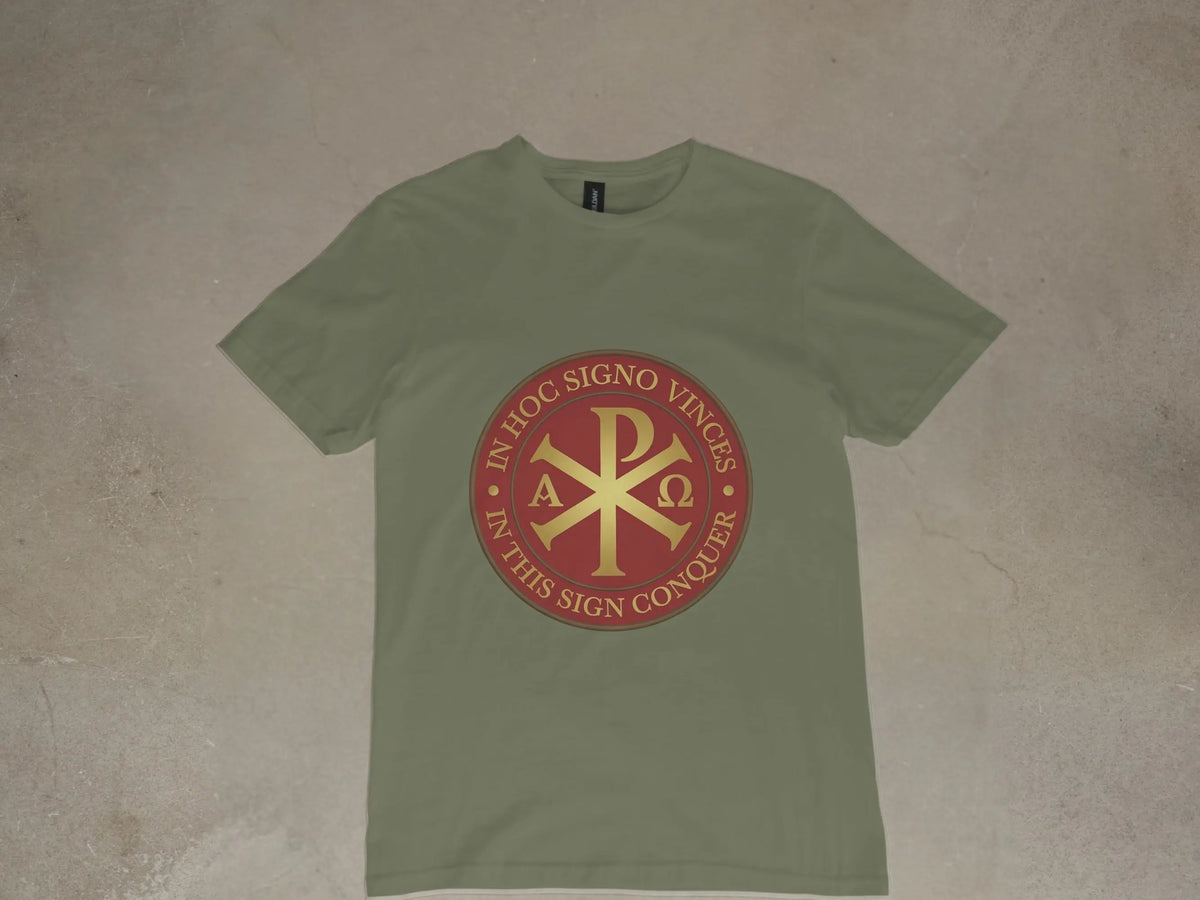 Olive t-shirt with a circular gold and red Chi Rho symbol and Latin text.