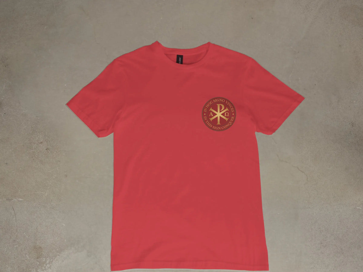Red t-shirt with gold circular emblem reading "In Hoc Signo Vinces."