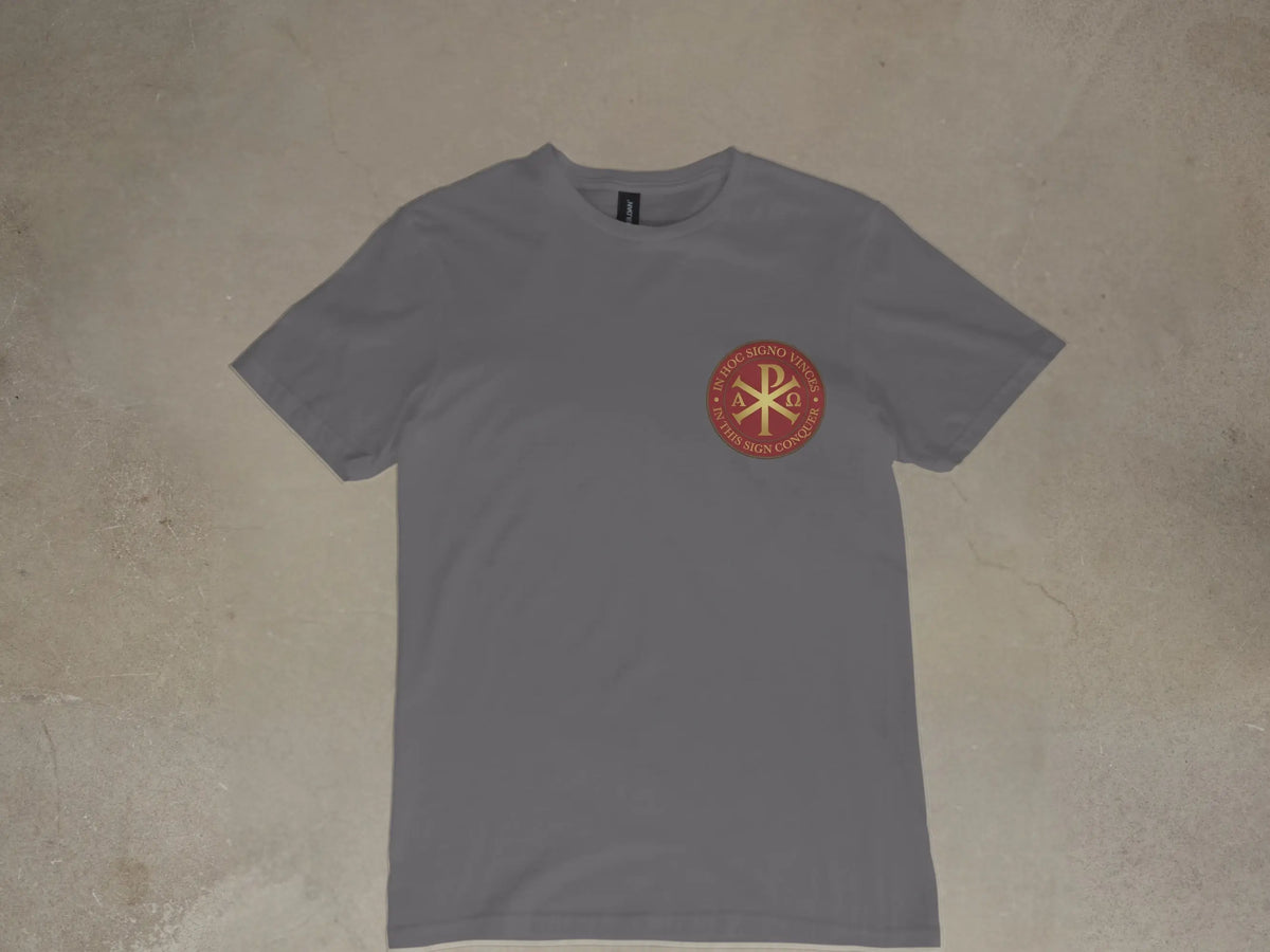 Grey t-shirt with circular emblem featuring Chi Rho symbol and Latin text.