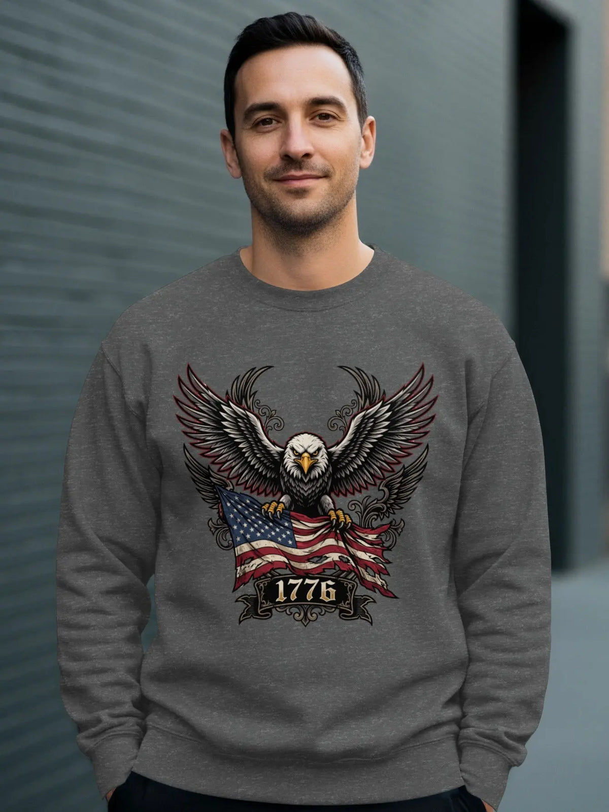 Grey crewneck sweatshirt with eagle graphic and "1776" text.