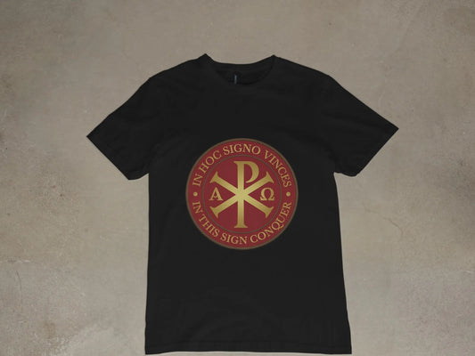 Black t-shirt with a gold chi-rho symbol and Latin text "In hoc signo vinces".